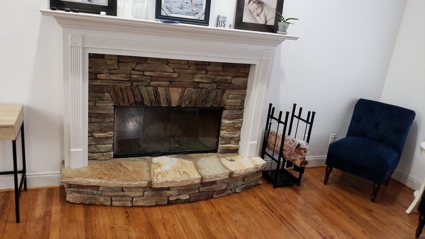 Stone fireplace, cleaned and ready for the season